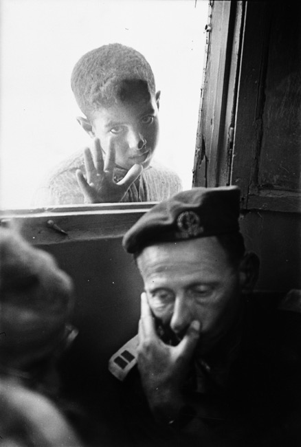 Figure 7: “Arab-Israeli conflict of 1967. Ramallah, Kalandia. A few days after the Six-Day War, an Israeli officer considers an ICRC proposal, under the gaze of a Palestinian boy.” (Copyright Jean Mohr / ICRC 1967)
